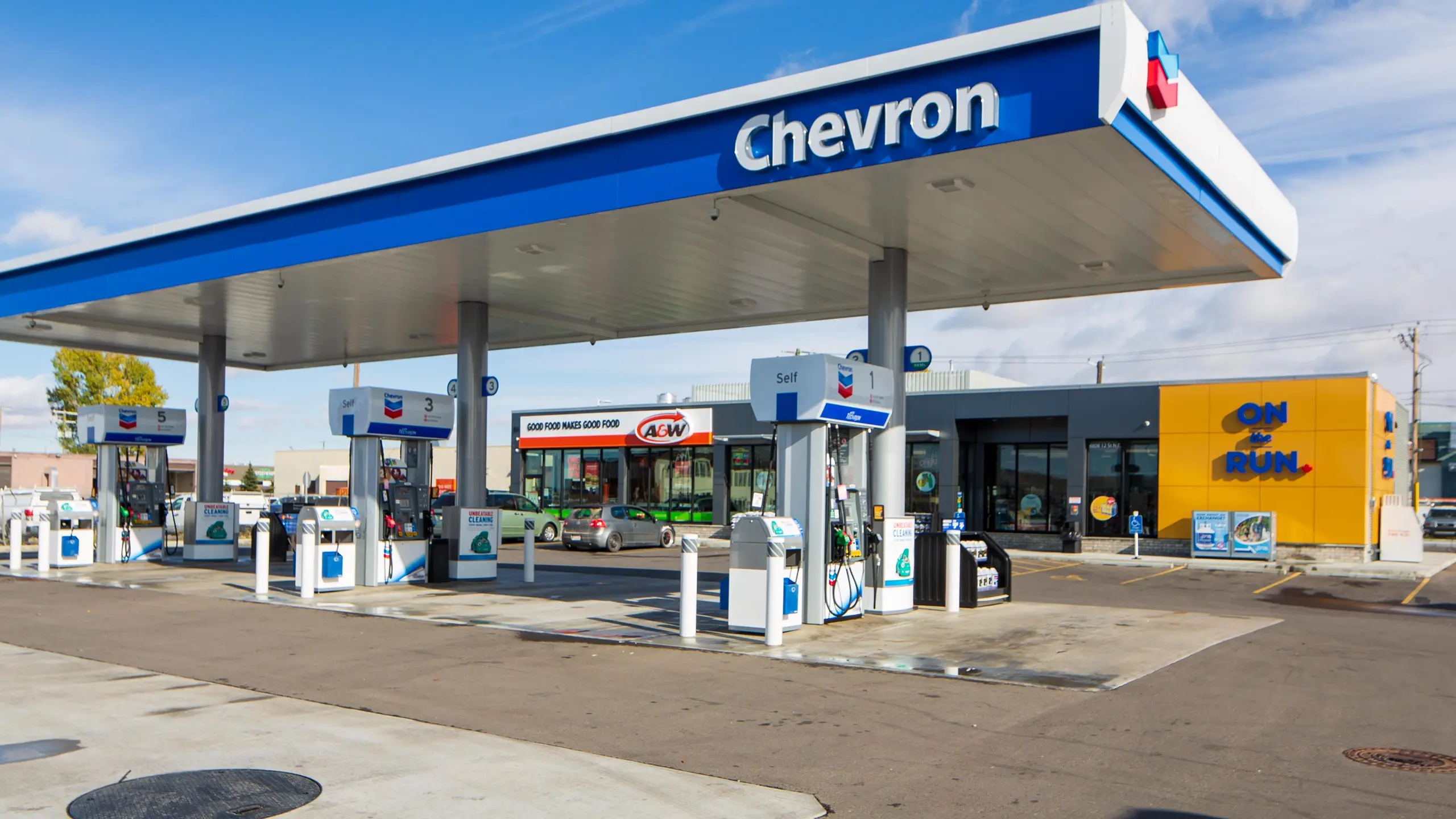 Chevron gas station with ON the RUN in background.