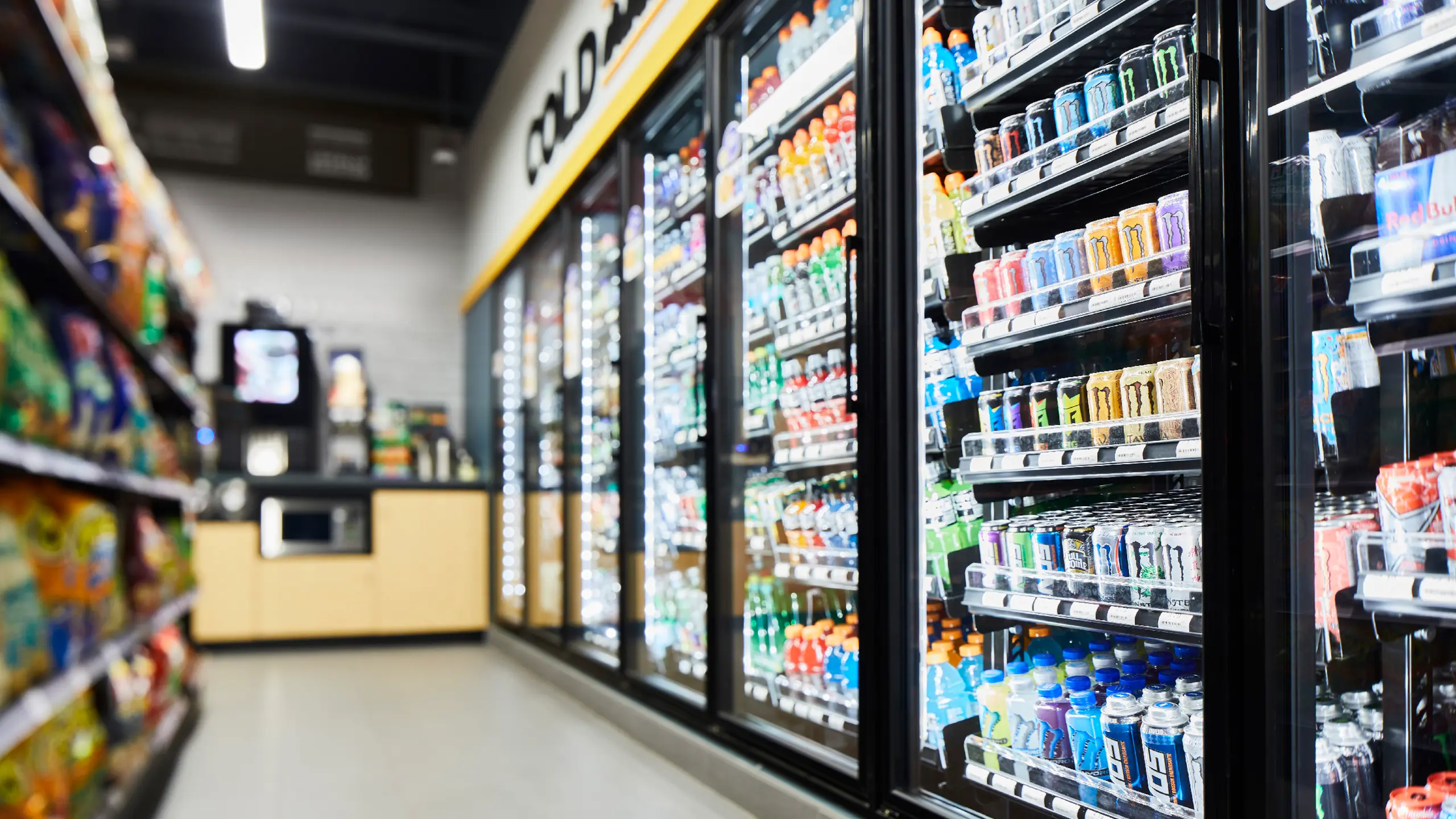 Convenience store showing beverage cooler.